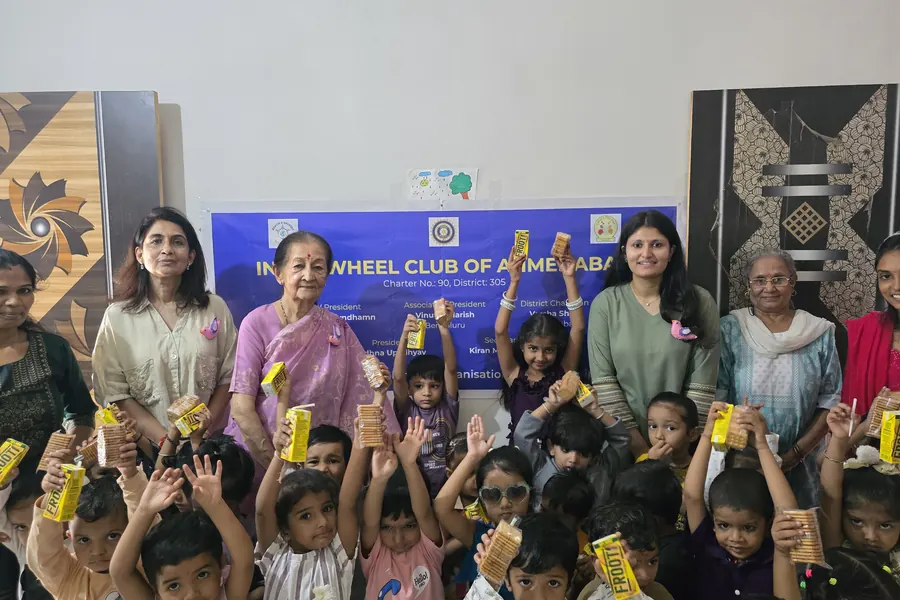 Children with the Inner Wheel Club of Ahmedabad on a visit to the centre