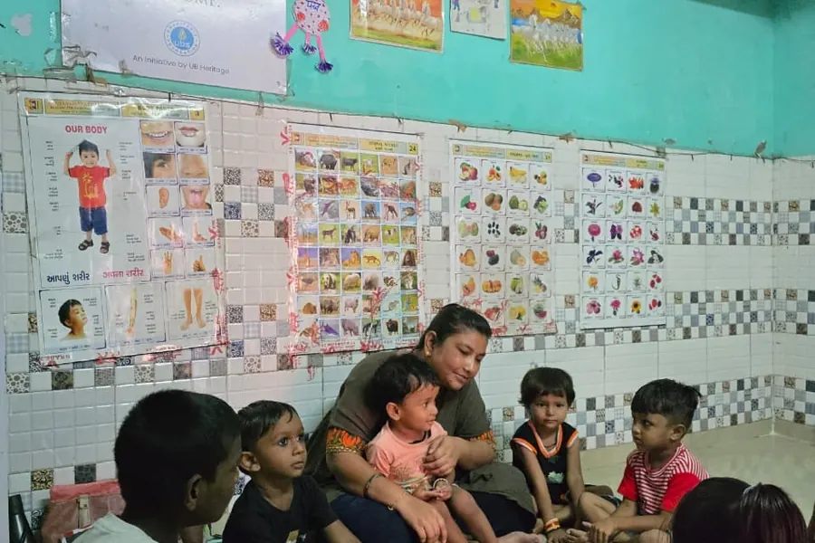 The youngest children with their teacher