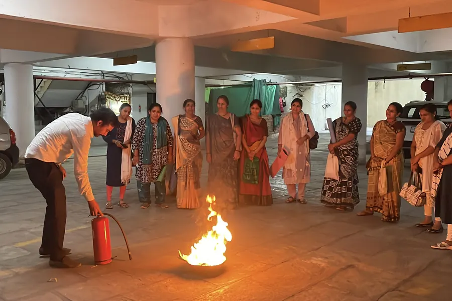 A fire safety demonstration, a controlled fire lit for the exercise