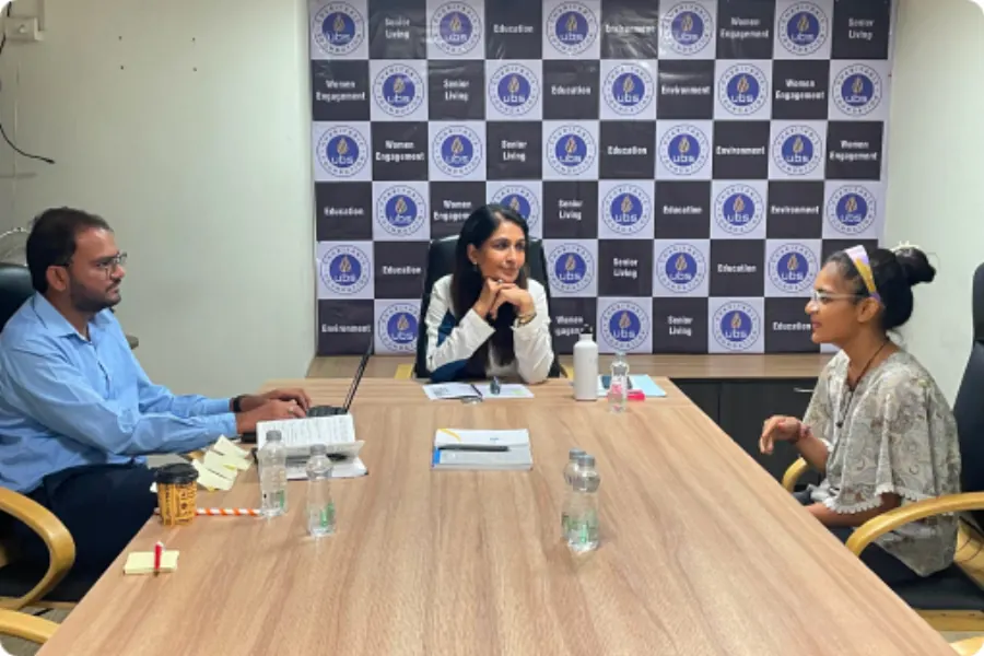 A student in conversation with the panel
