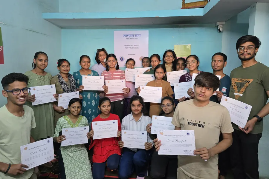 Students with the certificates they have just been awarded